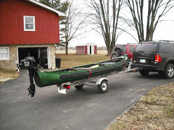 Trailex SUT-200-S Trailer Shown with Sportspal S-15 Canoe and Outboard